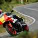 2024 Yamaha XSR900 GP riding past towards the camera