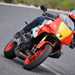 2024 Yamaha XSR900 GP on the road leaning into a left hand bend