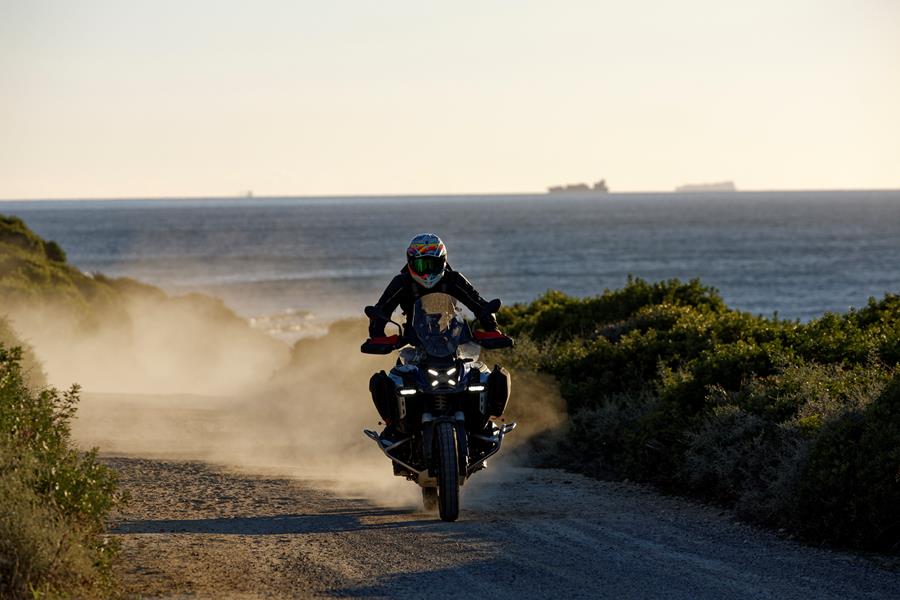 2024-on BME R1300GS Adventure riding away from the sunset