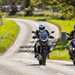 2024 BMW F900GSA and triumph tiger 900 Rally Pro - riding down road towards camera
